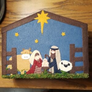 Handcrafted Nativity Scene Decor with Blue and Brown Accents